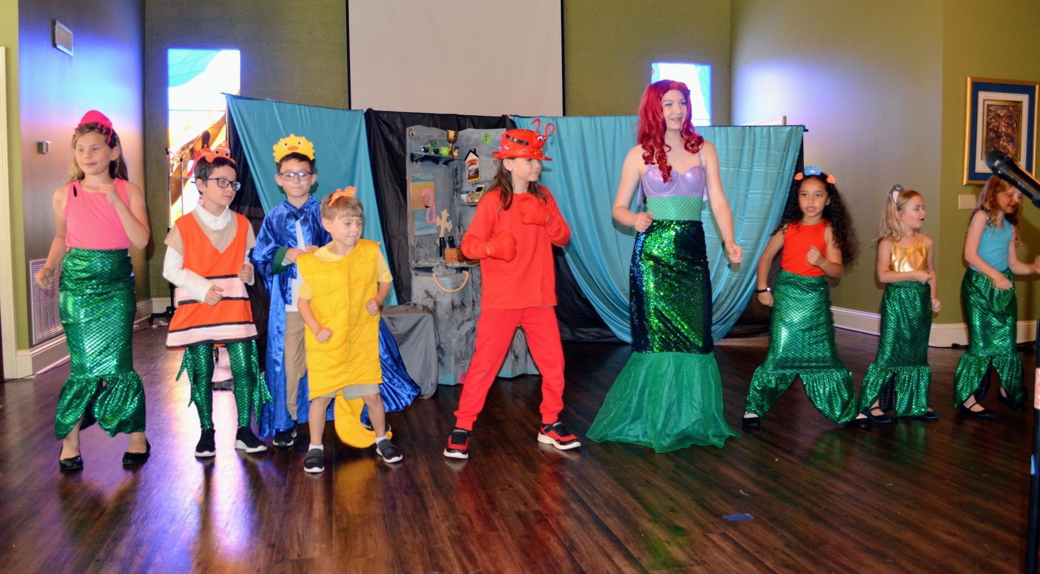Little Mermaid Jr mermaids dancing with fish and crab